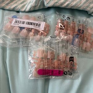 3 packages of press on French nails for toes with nail tapes
